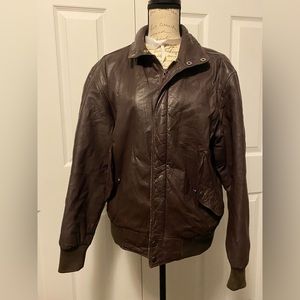 Mens size 40 Members Only brown leather jacket with pocket flaps, inside pocket